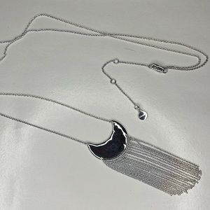 Stella Abbot silver delicate chain and pendant.
